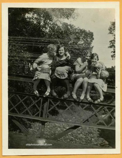 Flappers Sitting on a Trestle